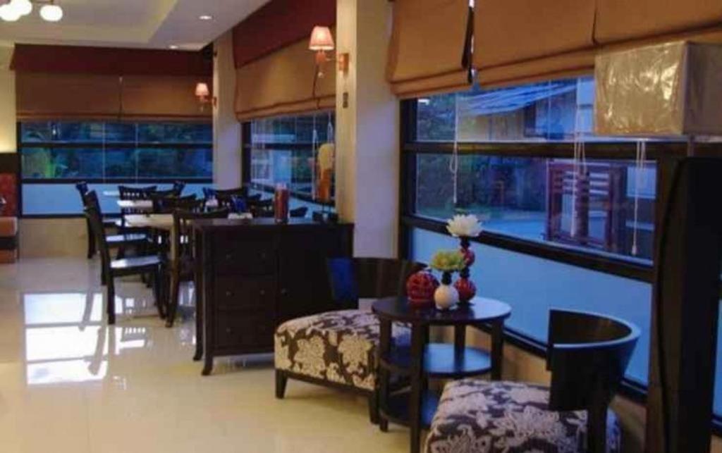 The Red Palm Suites And Restaurant Butuan City Exterior foto